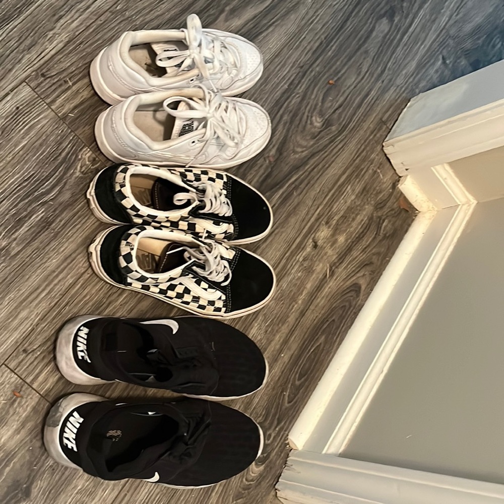 3 pairs of shoes. 2 Nike, one pair of vans. Partially warn,in good condition:)